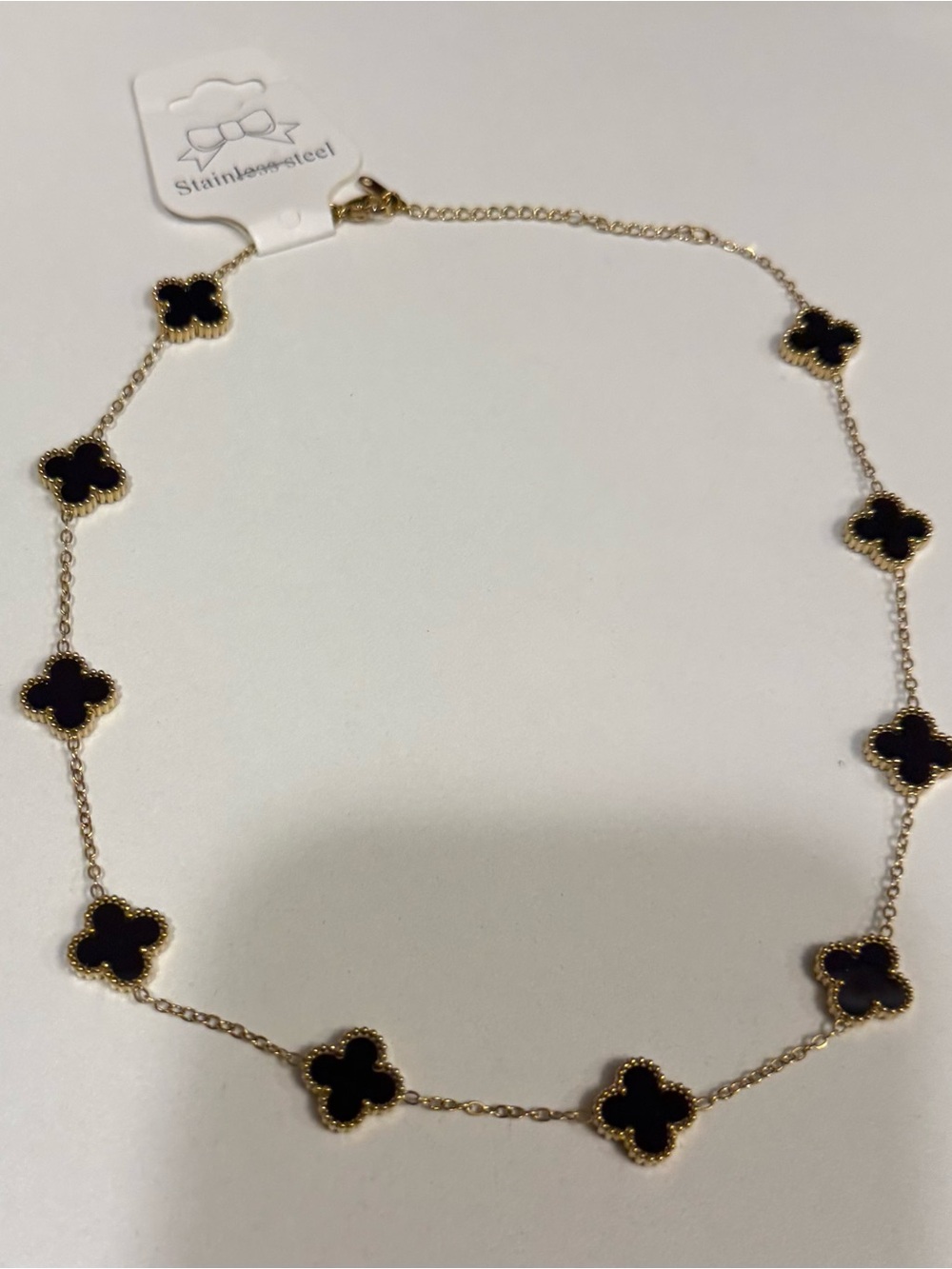 Gold Stainless Steel Necklace with Black Clover Accents